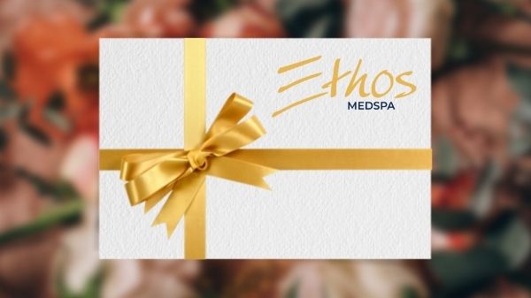 Ethos gift card on a floral background.